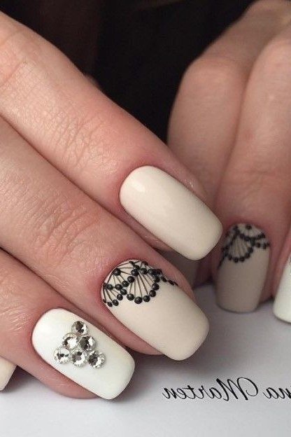 Ivory Almond Nails with Black Lace Accent Nails - elegant almond nail idea for women over 60