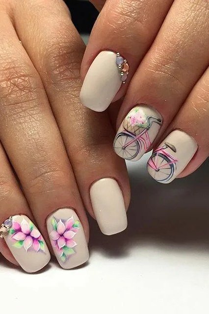 Ivory Almond Nails with Floral Paisley Accent Nails - elegant almond nail idea for women over 60