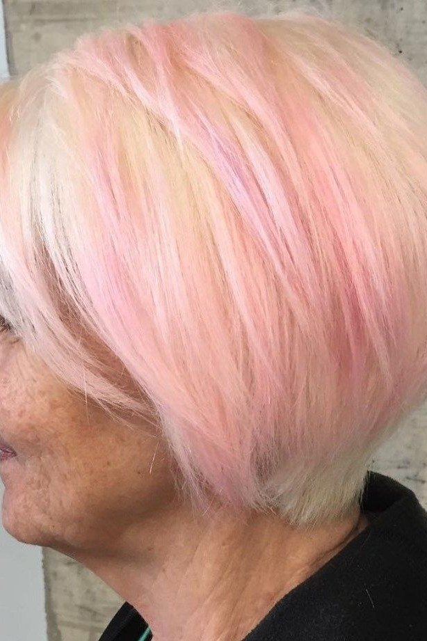 Pastel pink layered bob for women over 50