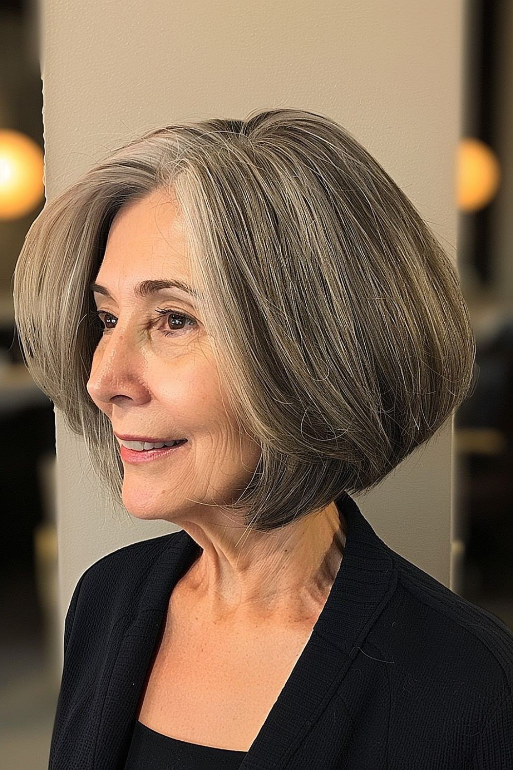 Brown-grey rounded layered bob for women over 50