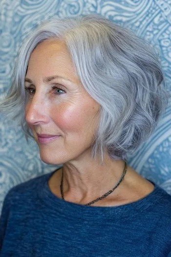 Silver wavy layered bob for older women