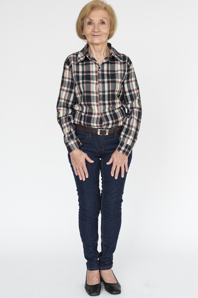 Plaid shirt with dark jeans and black flats for older women