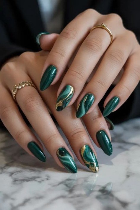Emerald Nails with a Gold Marble Accent - emerald green nail design for women over 50