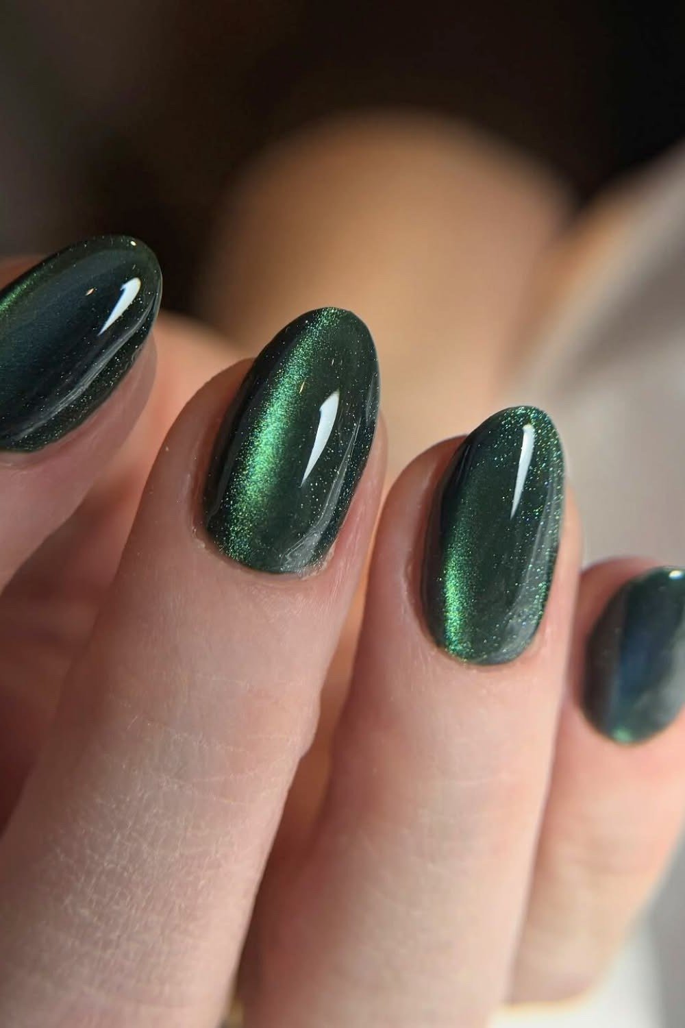 Emerald Cat-Eye Close-Up - emerald green nail design for women over 50