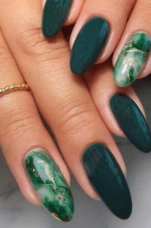 Emerald Nails with a Long Marble Accent - emerald green nail design for women over 50
