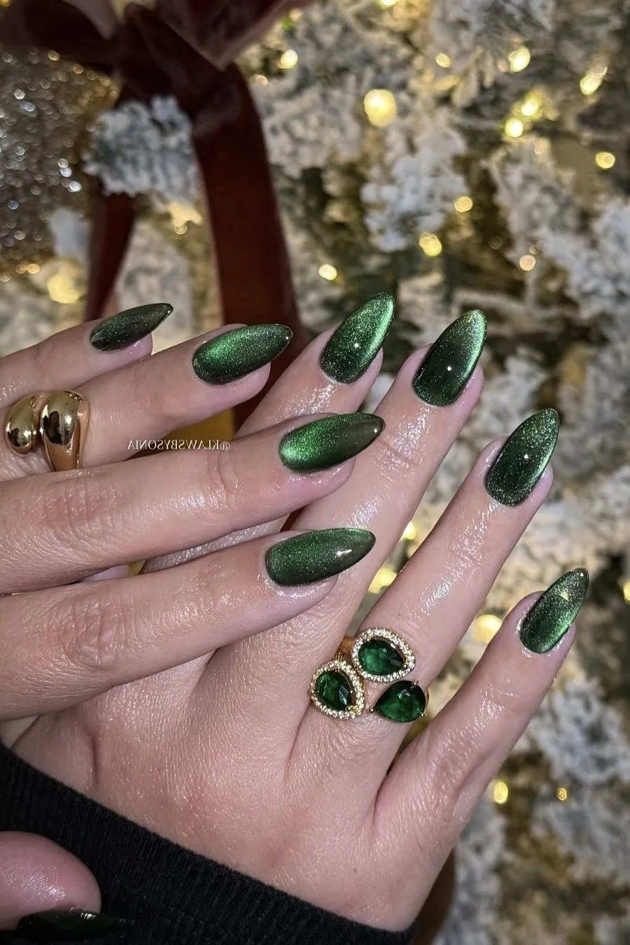 Green Cat-Eye Nails at Christmas - emerald green nail design for women over 50