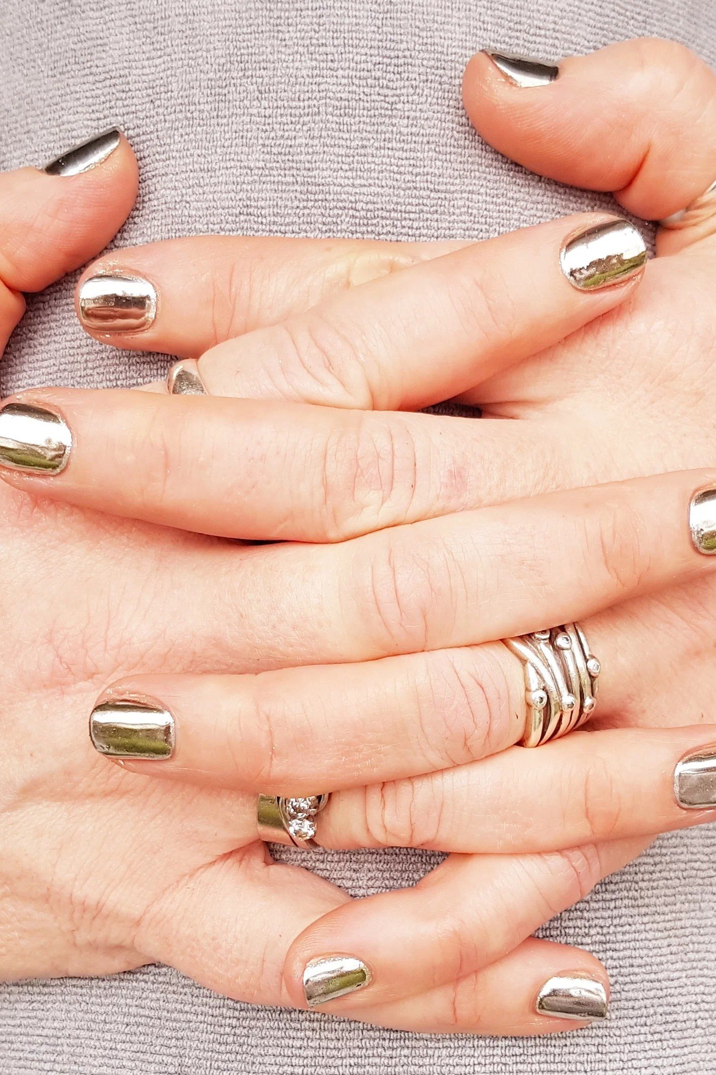 Gold chrome mirror nails, elegant nail idea for women over 50