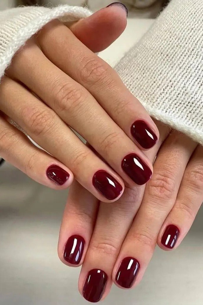 Burgundy wine glossy nails, elegant nail idea for women over 50