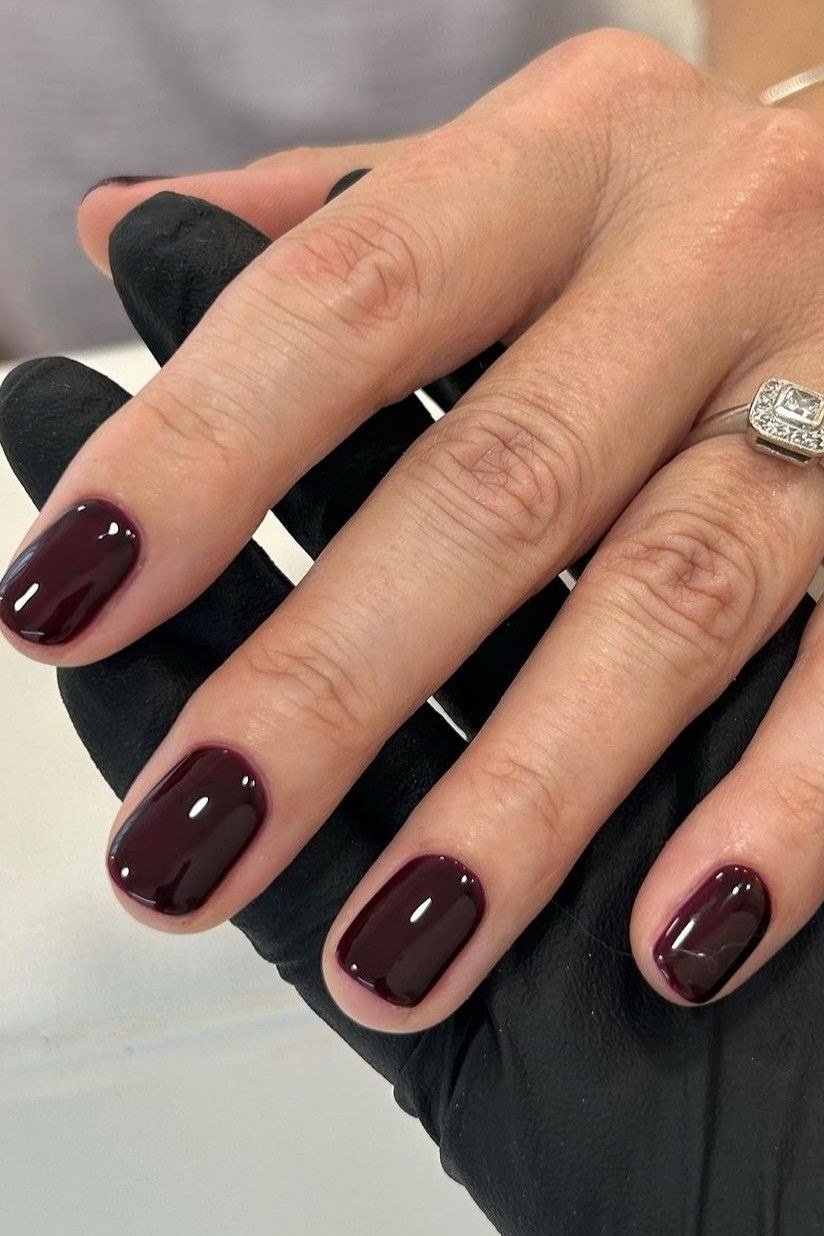 Deep vampy burgundy nails, elegant nail idea for women over 50