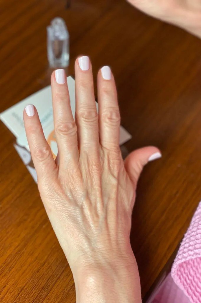 Pale nude-white minimalist nails, elegant nail idea for women over 50