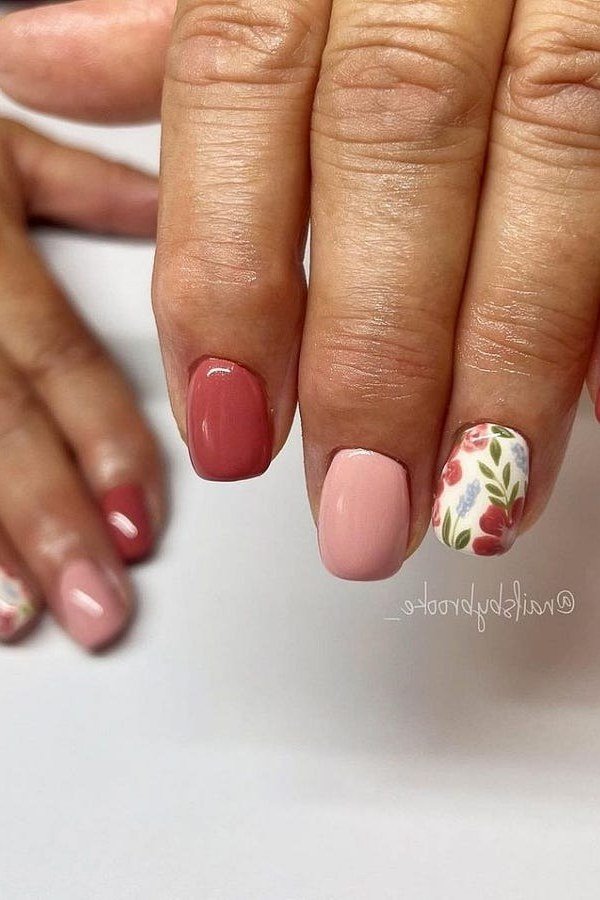 Rose-pink nails with floral accent, elegant nail idea for women over 50