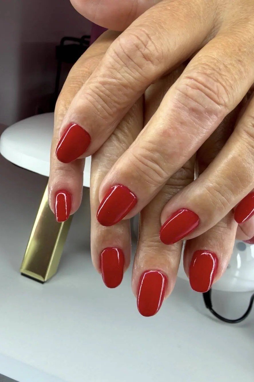 Long-Lasting Red Almond Nails, elegant nail idea for women over 60