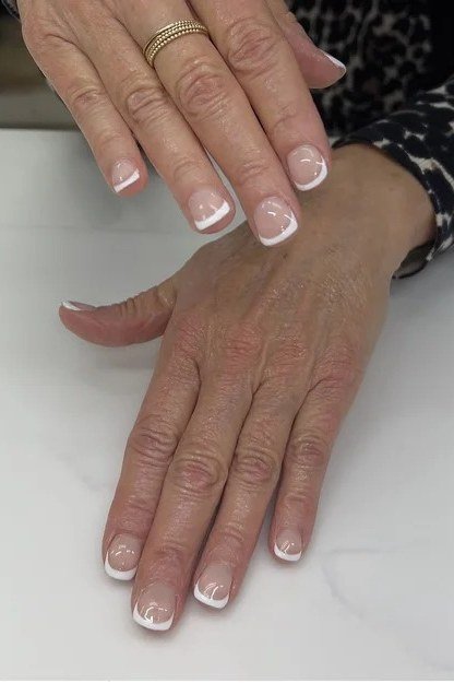 Dusty Mauve with a Statement Ring, elegant nail idea for women over 60