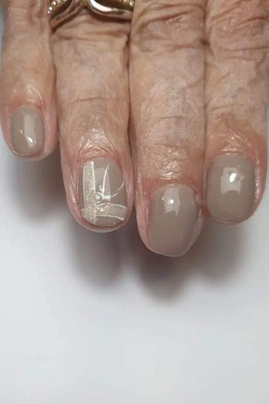 Soft Pink on Mature Hands, elegant nail idea for women over 60