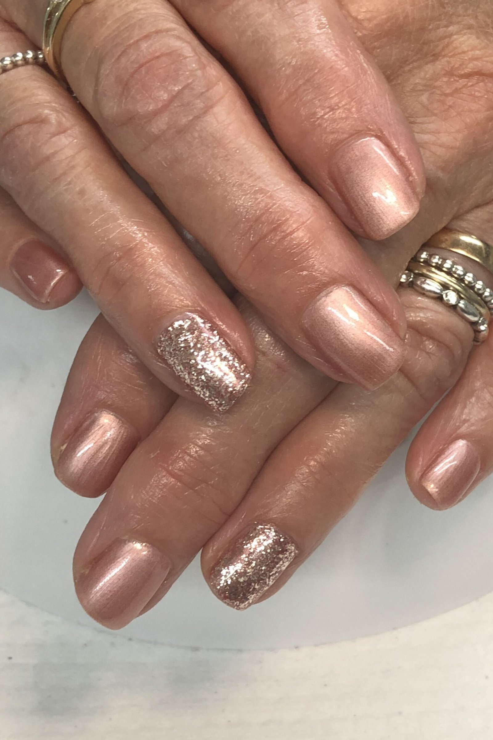Glossy Baby Pink, elegant nail idea for women over 60
