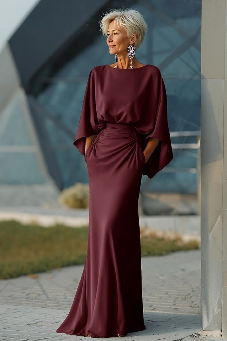 Burgundy satin cape-sleeve gown, elegant party outfit for women over 60
