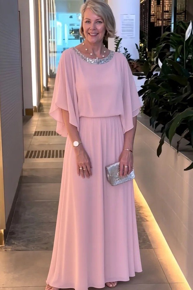 Pink chiffon cape-sleeve gown, elegant party outfit for women over 60