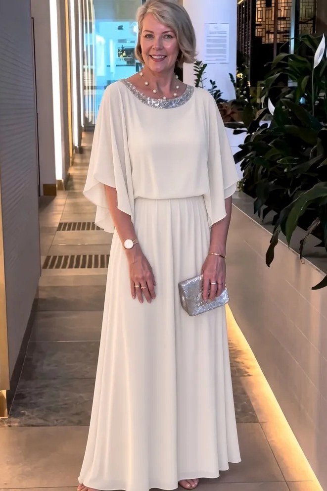 Ivory cape-overlay gown, elegant party outfit for women over 60