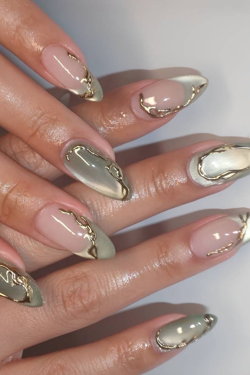 Nude nails with green and gold line art for women over 60