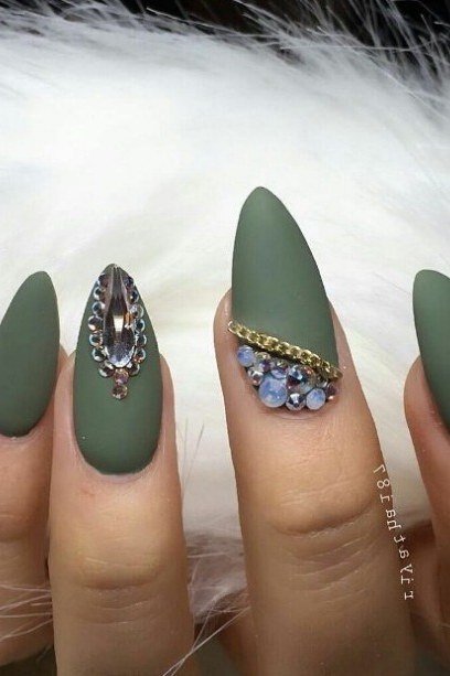Matte olive green nails with gold gem accents for women over 60