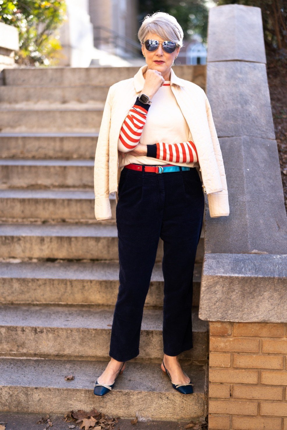 White Puffer Jacket with Striped Sweater, elegant winter outfit for women over 60