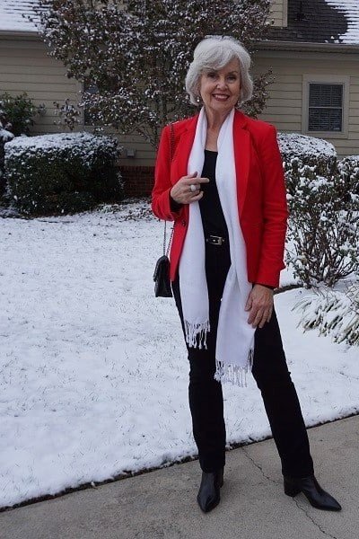 Red Wool Coat with White Scarf in the Snow, elegant winter outfit for women over 60