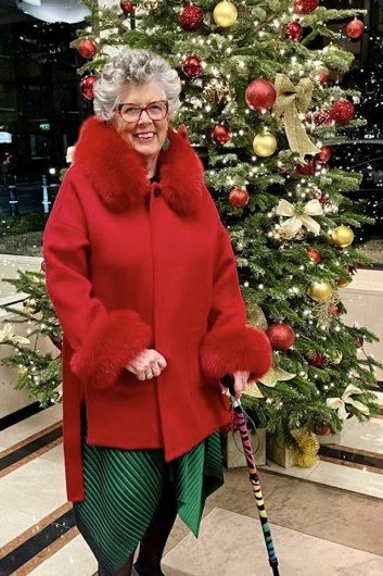 Red Fur-Collar Coat with Green Pants, elegant winter outfit for women over 60