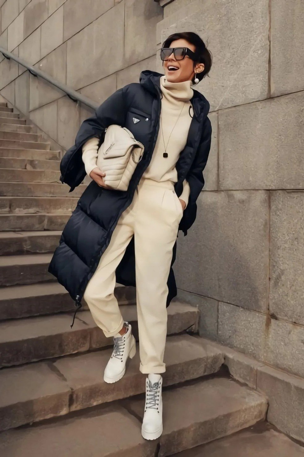 Black Puffer Vest with Cream Joggers, elegant winter outfit for women over 60