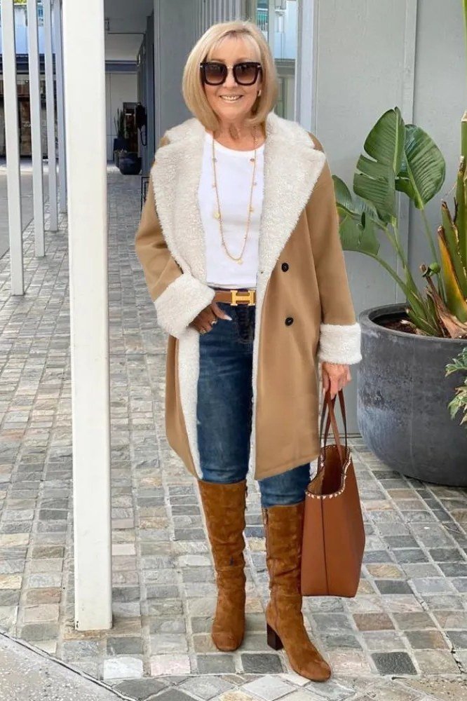 Camel Shearling Coat with Jeans and Tan Boots, elegant winter outfit for women over 60