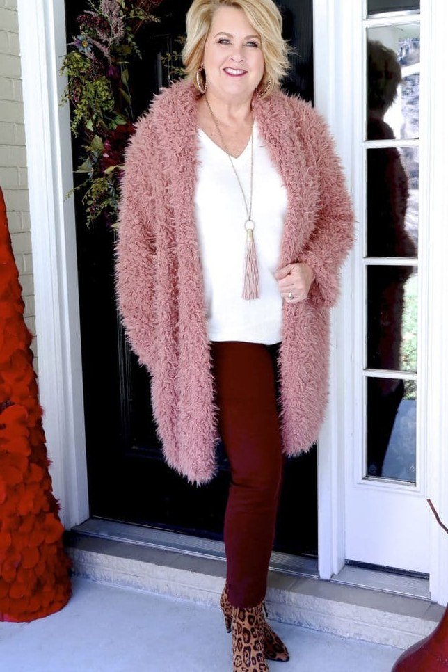 Pink Fuzzy Coat with Burgundy Pants, elegant winter outfit for women over 60