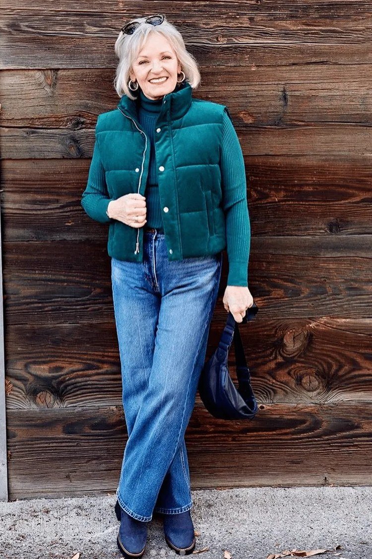 Teal Puffer Vest with Blue Jeans, elegant winter outfit for women over 60