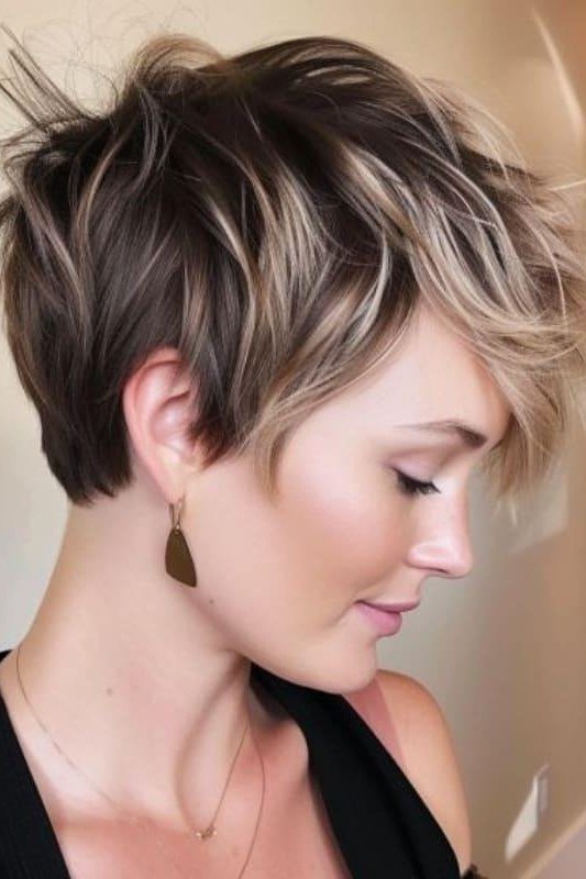 Brown Highlighted Textured Pixie, an elegant short haircut for older women