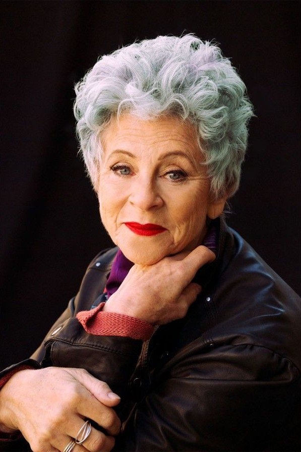 Front-Facing White Curly Pixie Crop, an elegant short haircut for older women