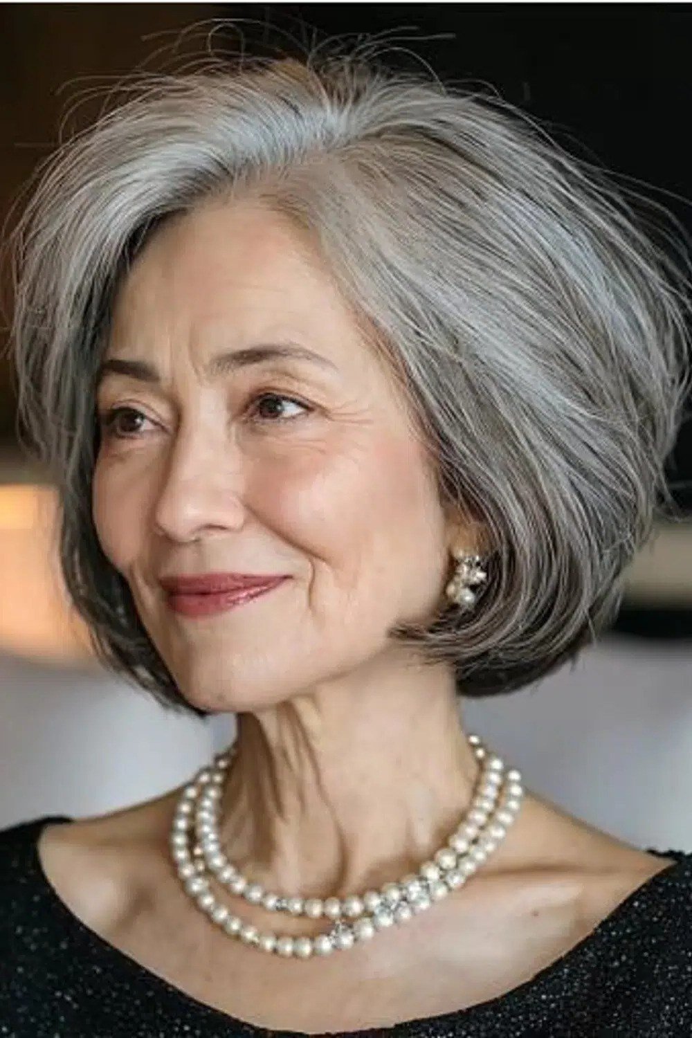 Silver Bob with an Elegant Pearl Necklace, an elegant short haircut for older women