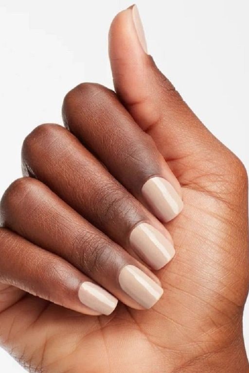 Milky White on Dark Skin, elegant winter nail color idea for older women