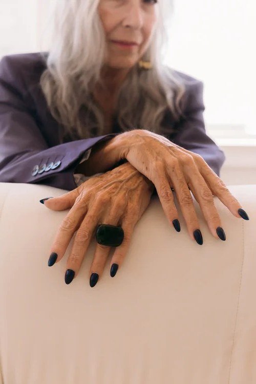 Confident Glossy Black, elegant winter nail color idea for older women