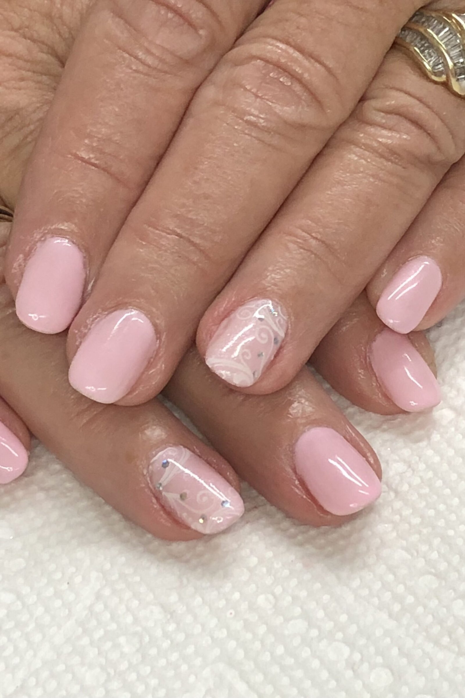 Short Pink with White Lace Accents - elegant wedding nails for women over 60