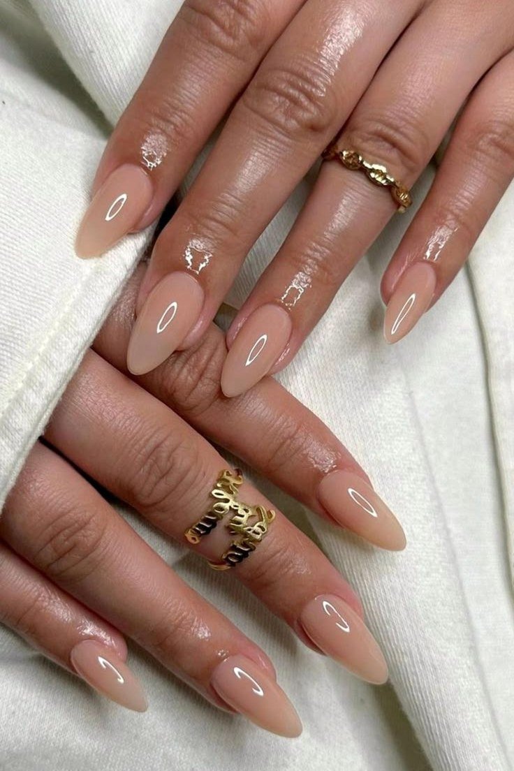 Nude Almond Nails With Gold Accents - nude almond nails with delicate gold accents - elegant nail idea for women over 40