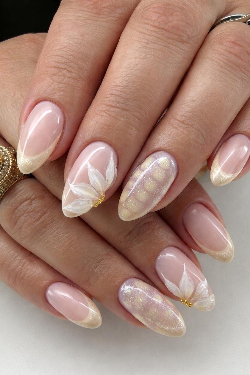White Nails With Daisy Art - white nails with daisy art and gold ring - elegant nail idea for women over 40
