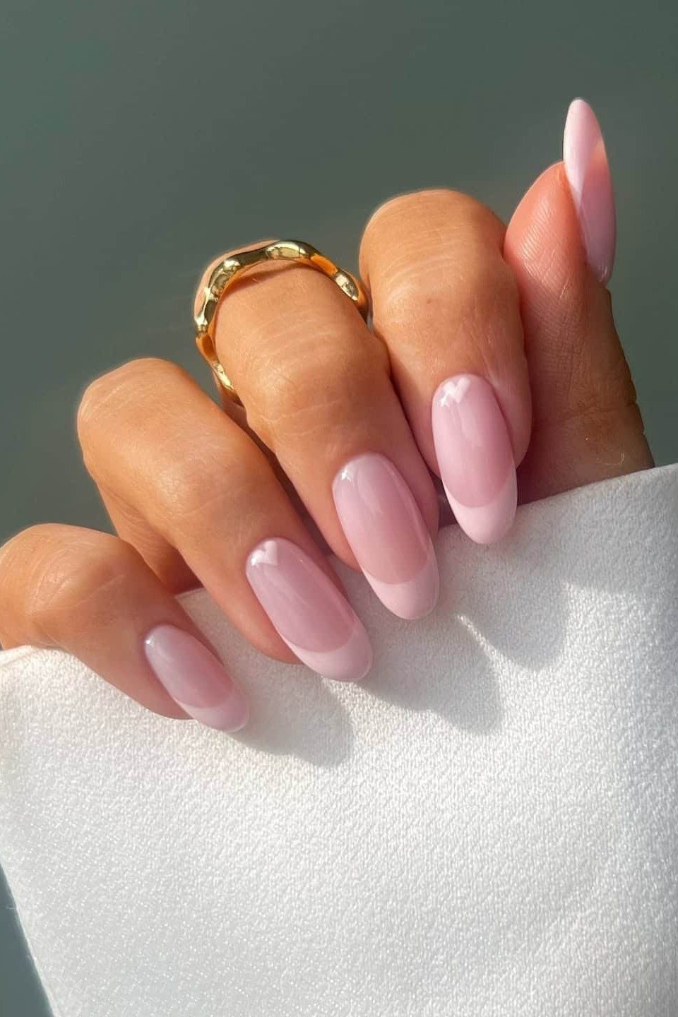 Soft Pink Medium Almond Nails - elegant short nail idea for women over 50