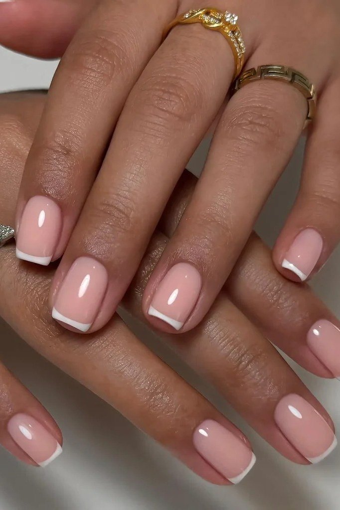 Blush Pink French Nails on Deep Skin - elegant short nail idea for women over 50