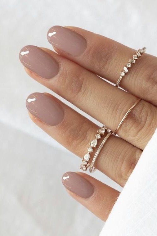 Nude Taupe Short Almond Nails - elegant short nail idea for women over 50