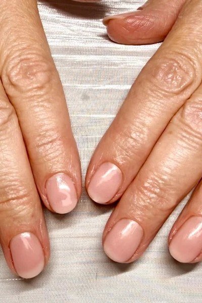 Sheer Pink Short Nails - elegant short nail idea for women over 50