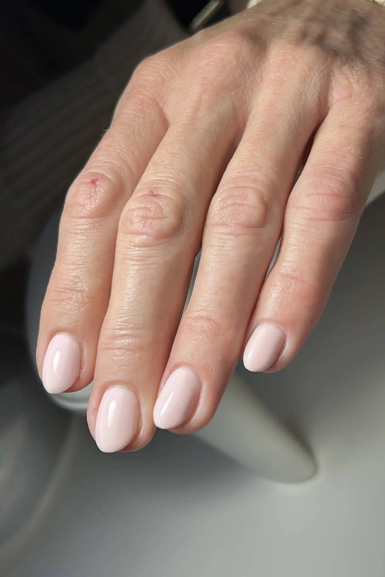 Milky White Short Squoval Nails - elegant short nail idea for women over 50