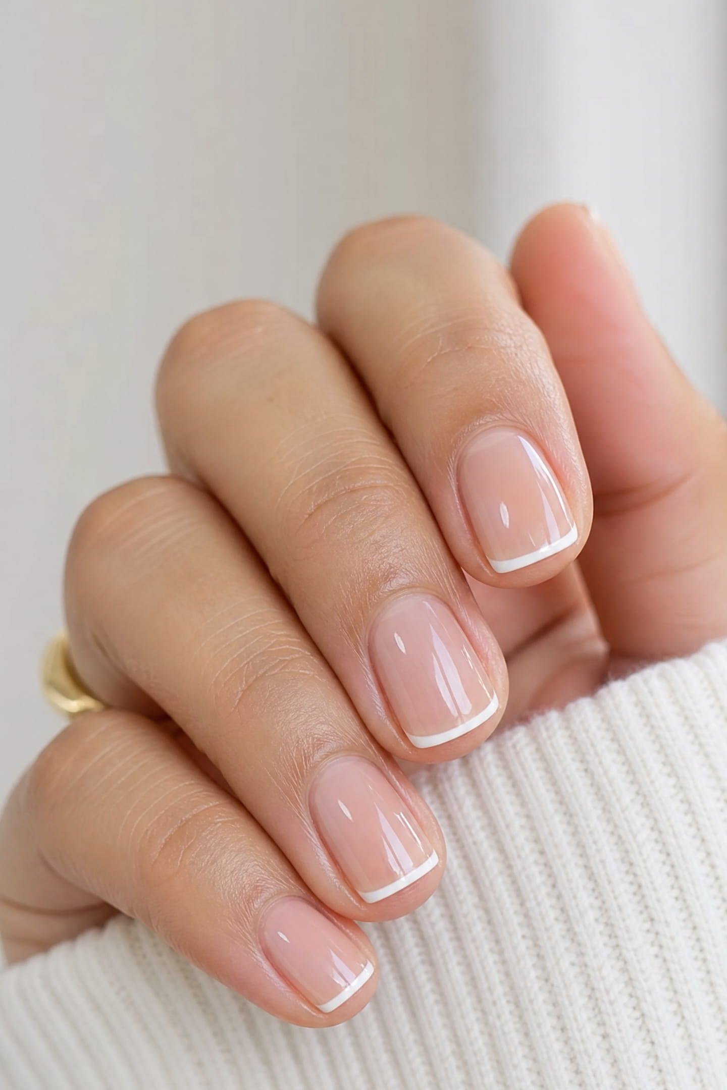 Sheer Pink Micro French Nails - elegant short nail idea for women over 50