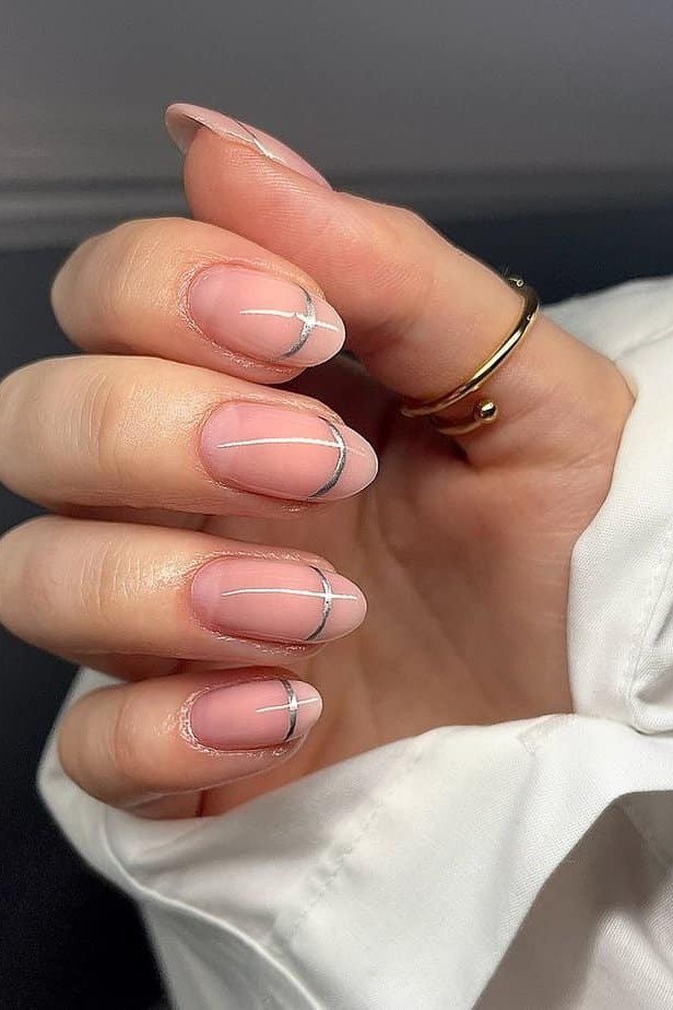 Pink French Nails with Gold Tips - elegant short nail idea for women over 50