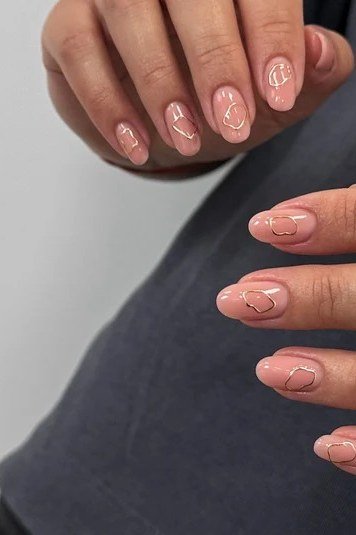 Nude Nails with Thin Gold Line Art - elegant short nail idea for women over 50