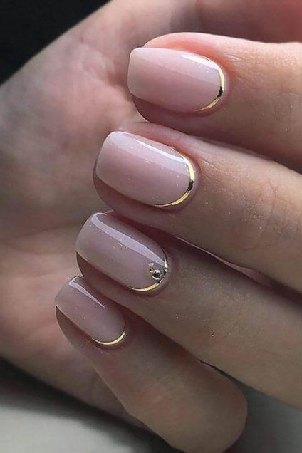 Blush Nails with Gold Chrome Tips - elegant short nail idea for women over 50