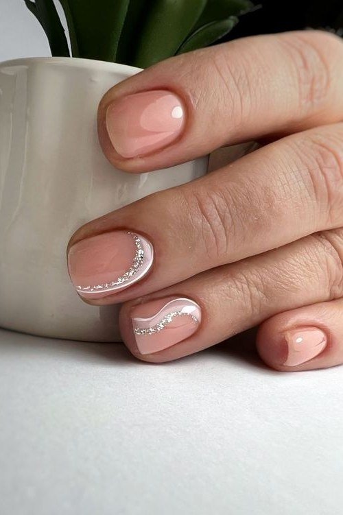 Nude Nails with Silver Crescent Art - elegant short nail idea for women over 50
