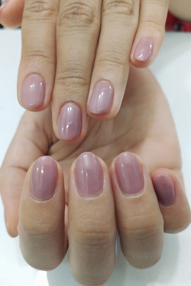 Mauve Short Oval Nails - elegant short nail idea for women over 50